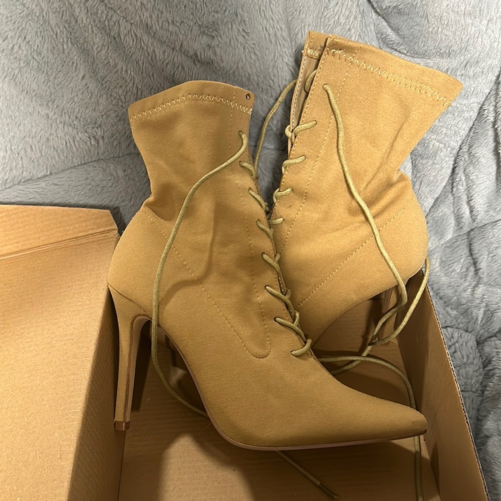 Tie up high heel boots